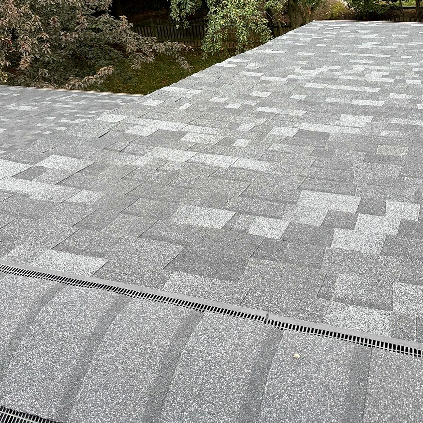 Low-profile ridge vent on a finished roof