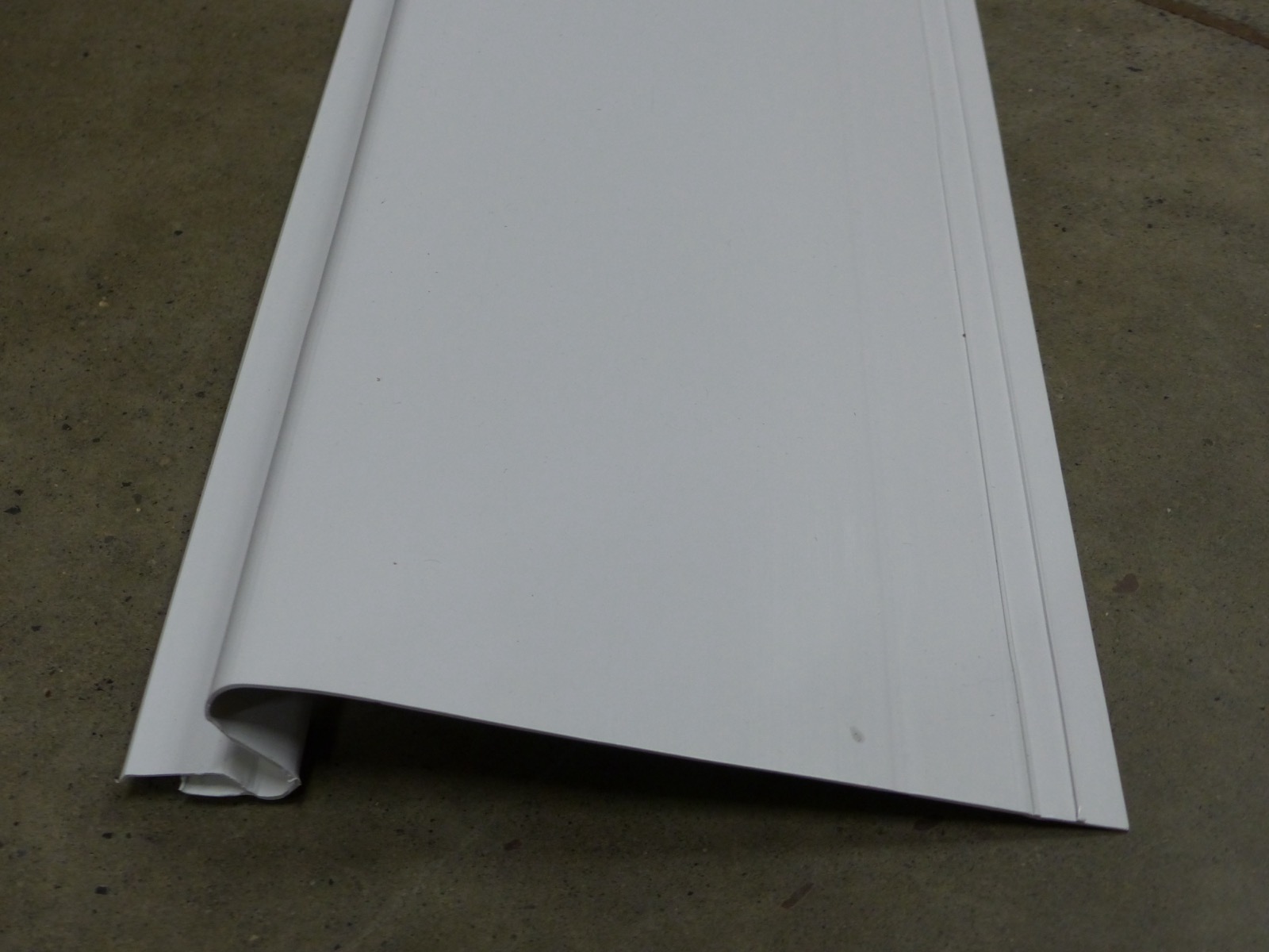 White hood-style leaf guard