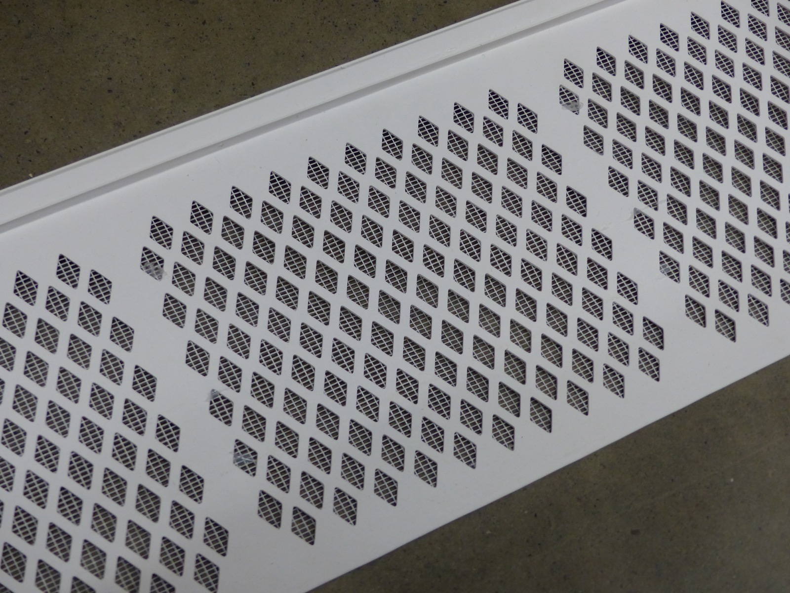 White screen-style gutter guard